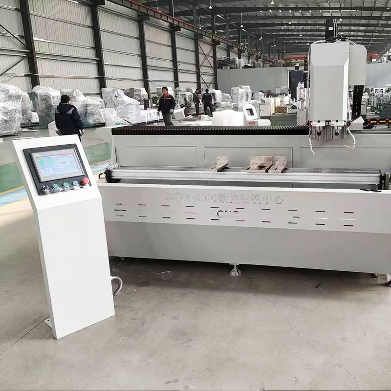 Máy khoan và phay CNC một đầu